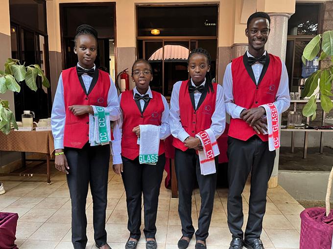 young intern waiting staff at hotel in Scotland